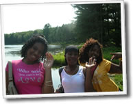 Three girls waving