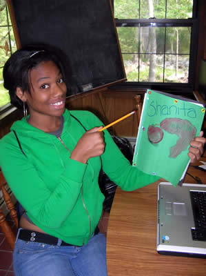 Shanita, one of our junior counselors, helping out with creative writing class